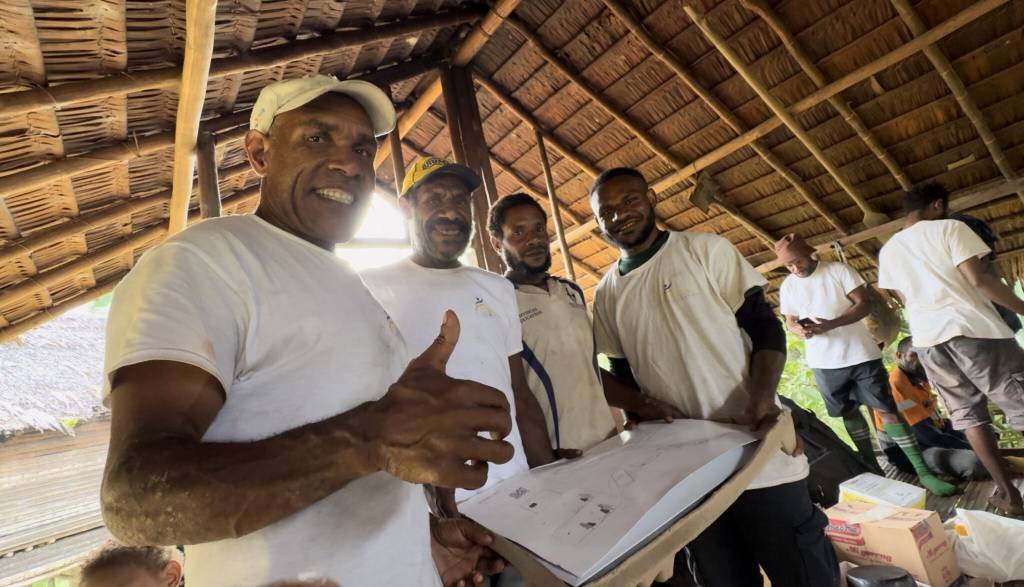 Community members and partners working together on a project